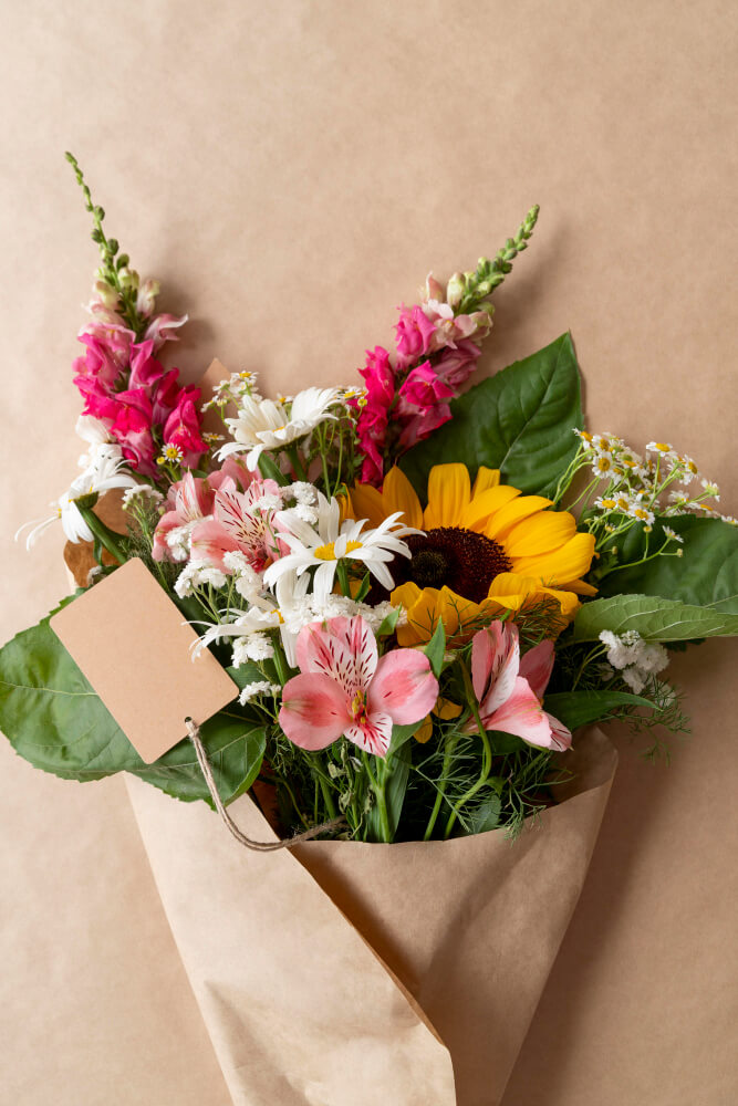top-view-bouquet-flowers-with-blank-card